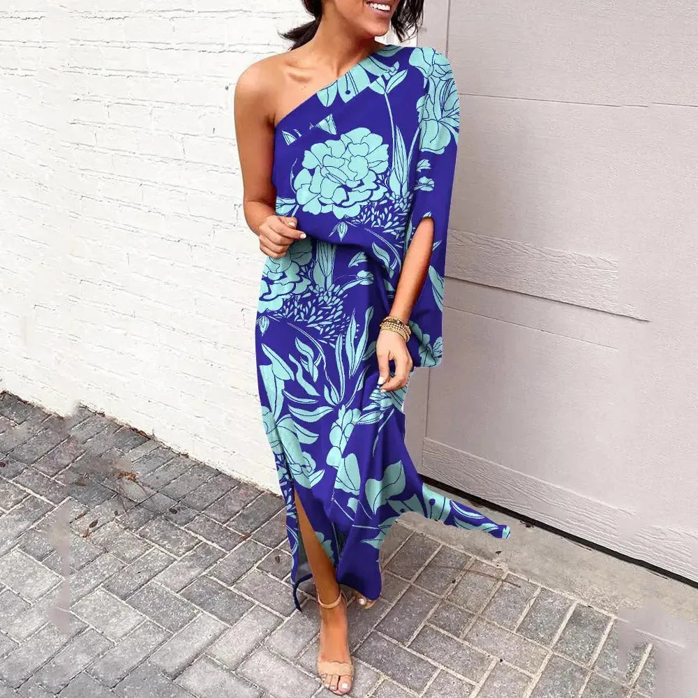 Blue cape sleeve maxi dress on model facing forward