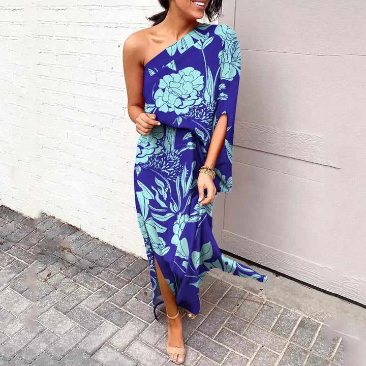 Blue cape sleeve maxi dress on model facing forward