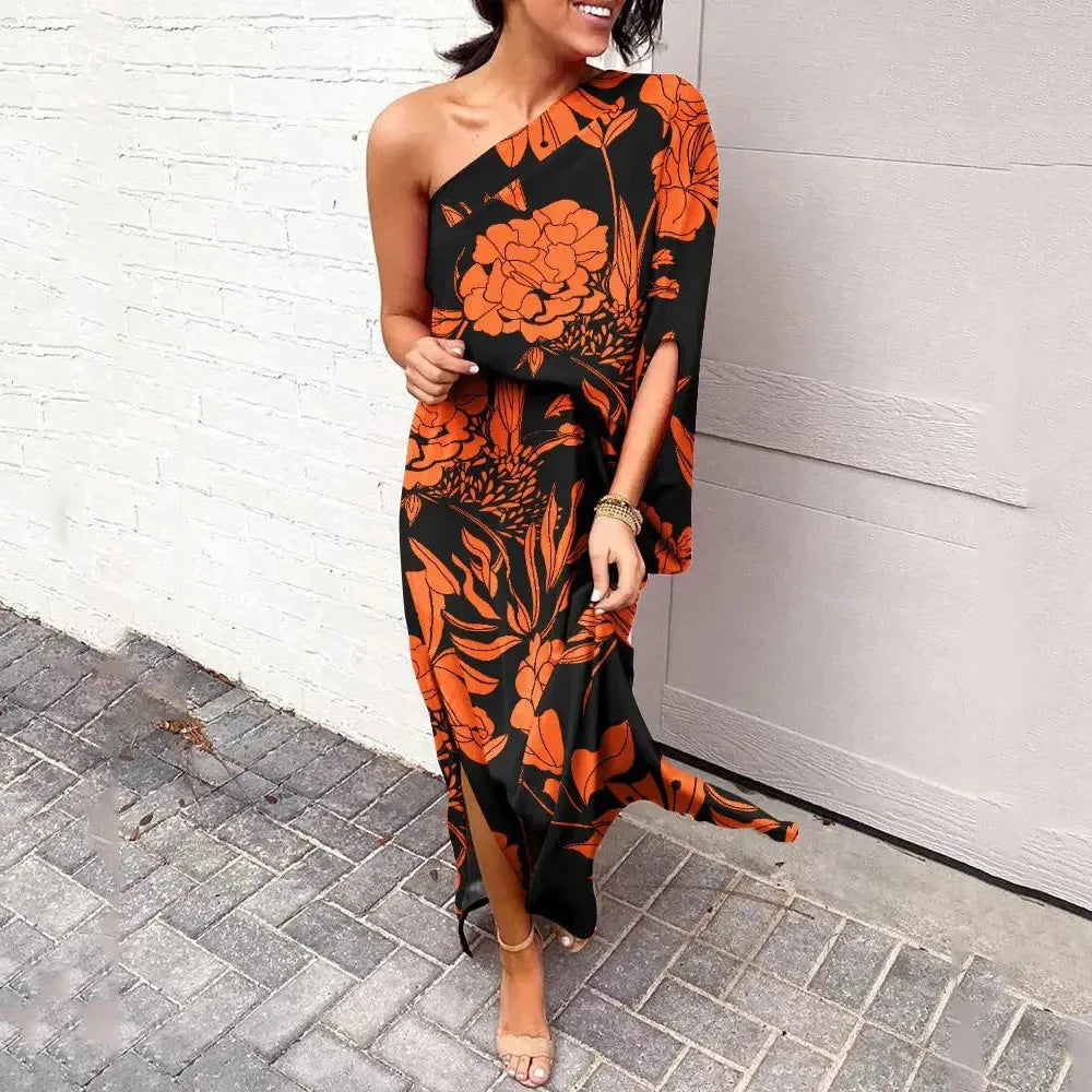 Orange cape sleeve maxi dress on model in three-quarter turn