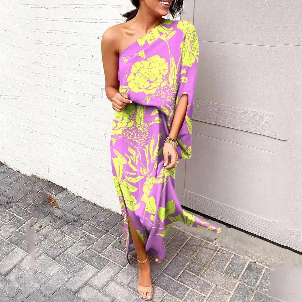 Purple cape sleeve maxi dress on standing model