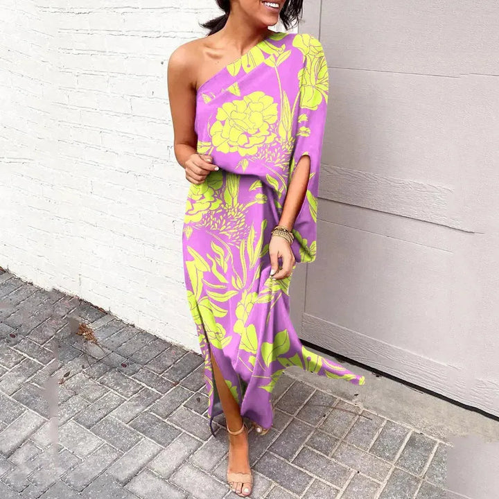 Purple cape sleeve maxi dress on standing model