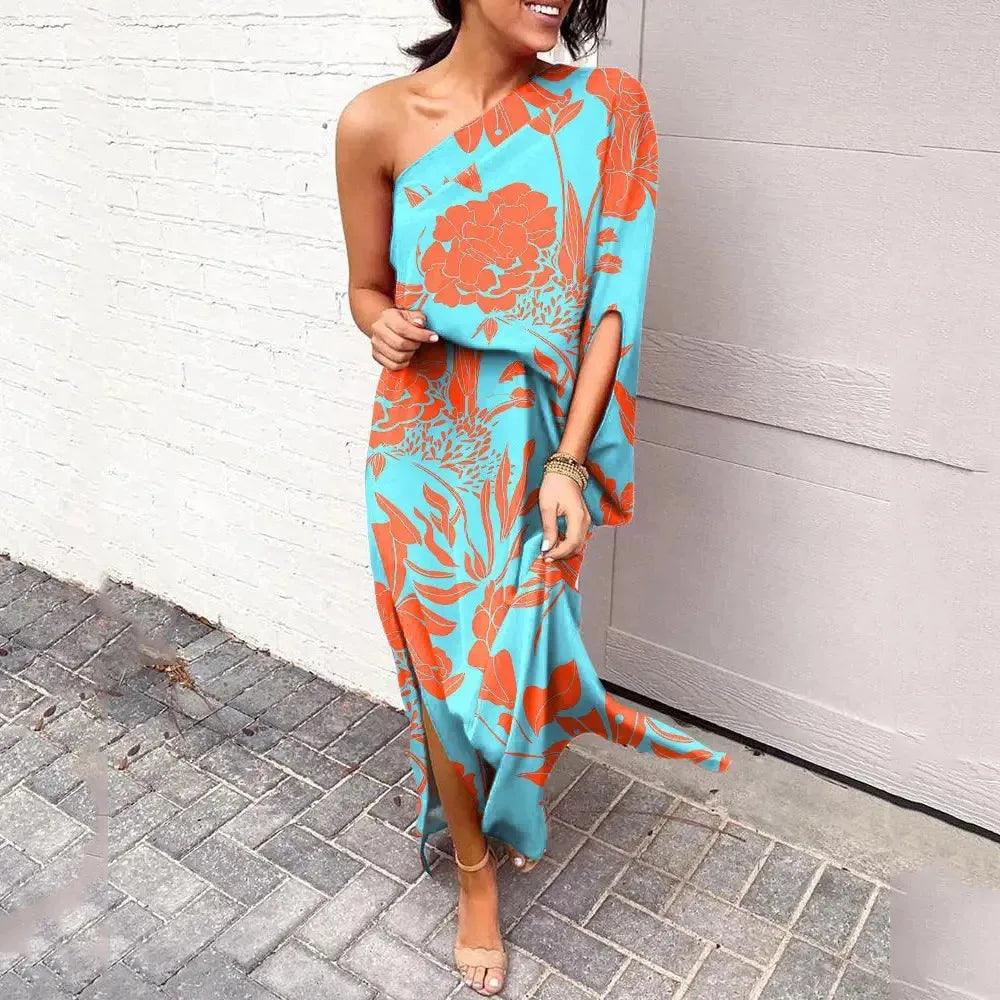 Turquoise cape sleeve maxi dress on standing model