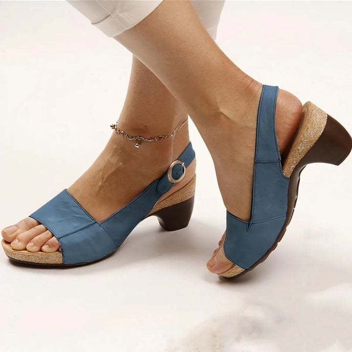 Blue block heel slingback sandal, rear view showcasing block heel and slingback strap