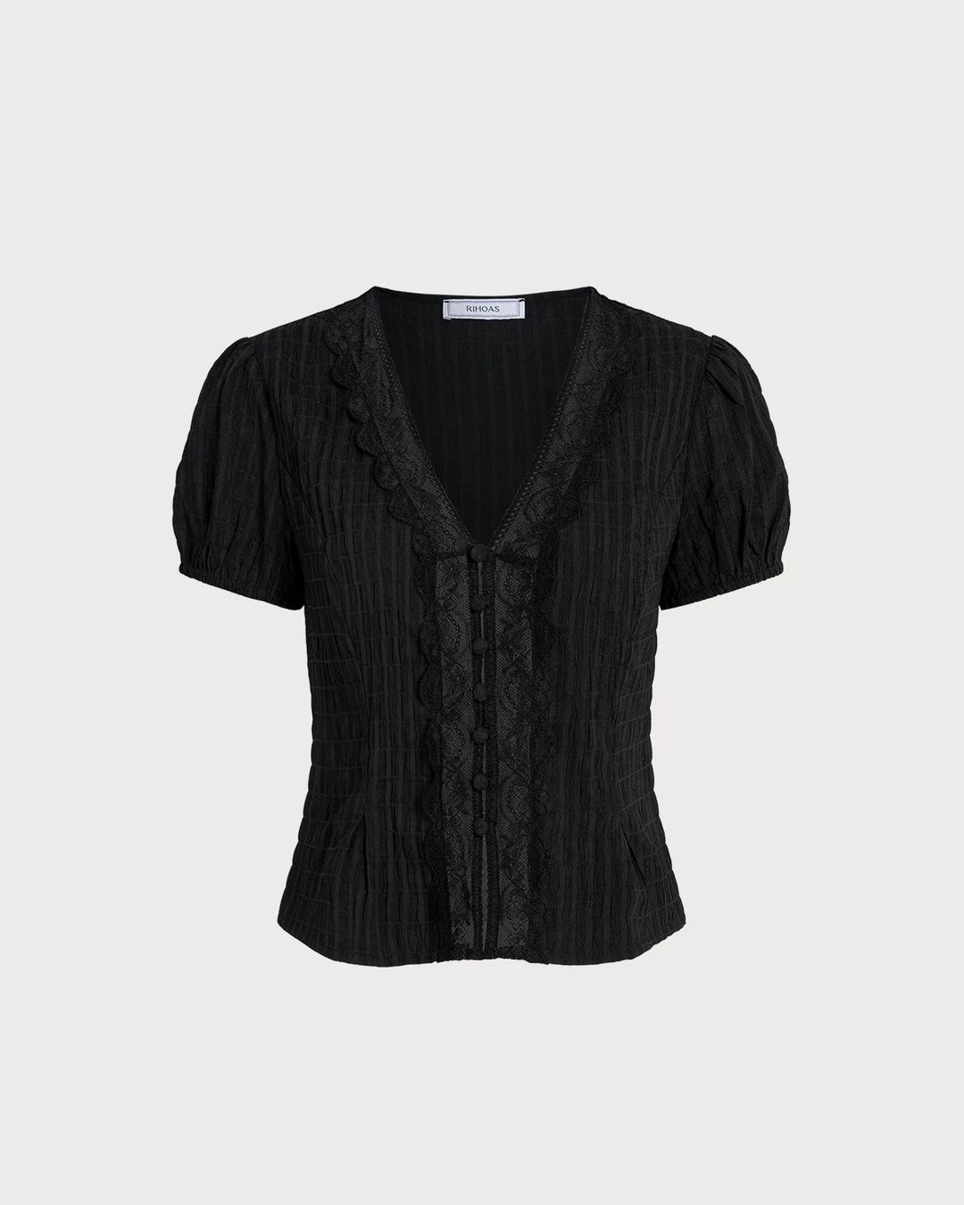 Black lace trim puff sleeve blouse, model in additional pose