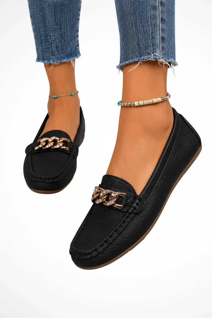Black leather loafer with gold chain detail, front view