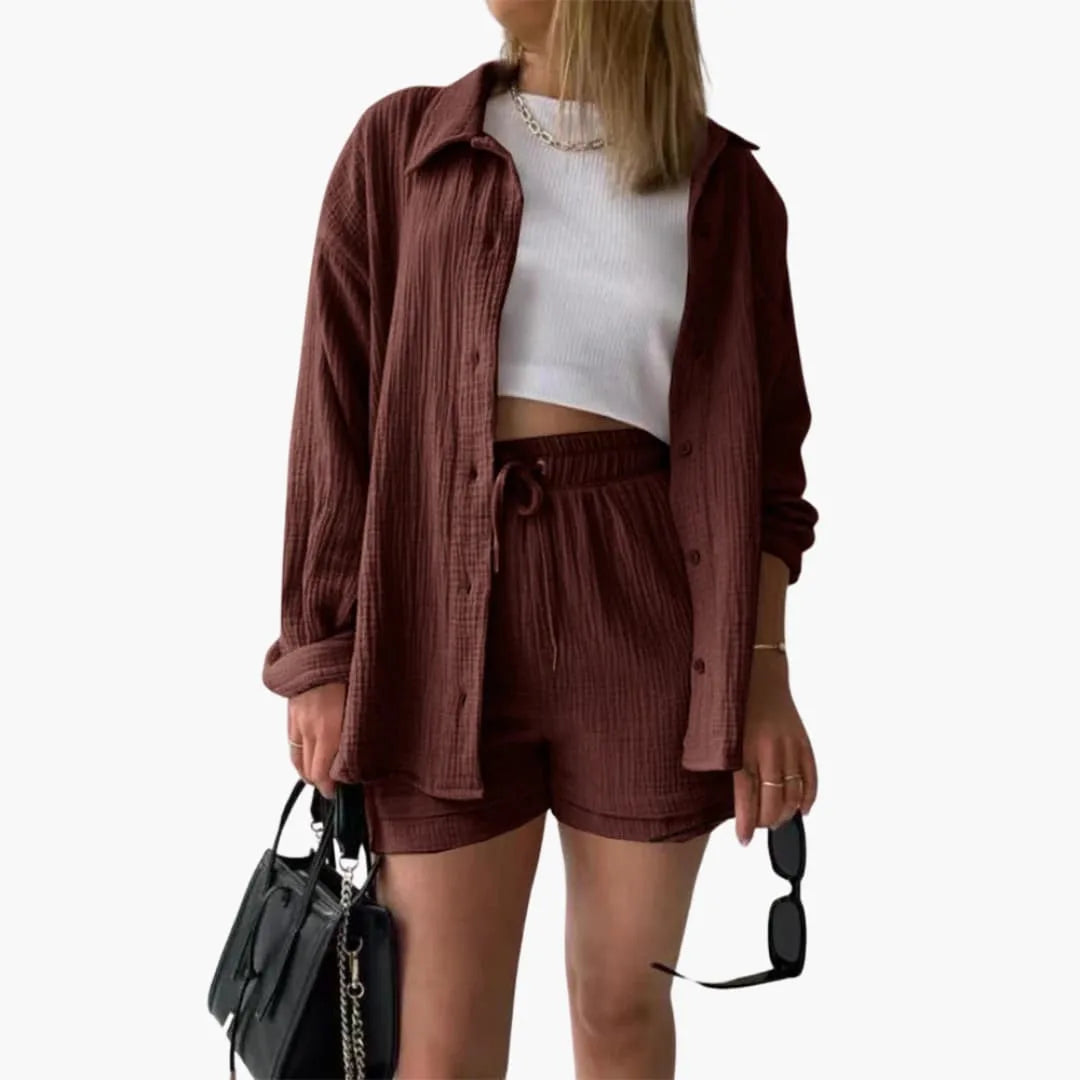 Model wearing a brown crinkle button-up shirt and matching shorts set