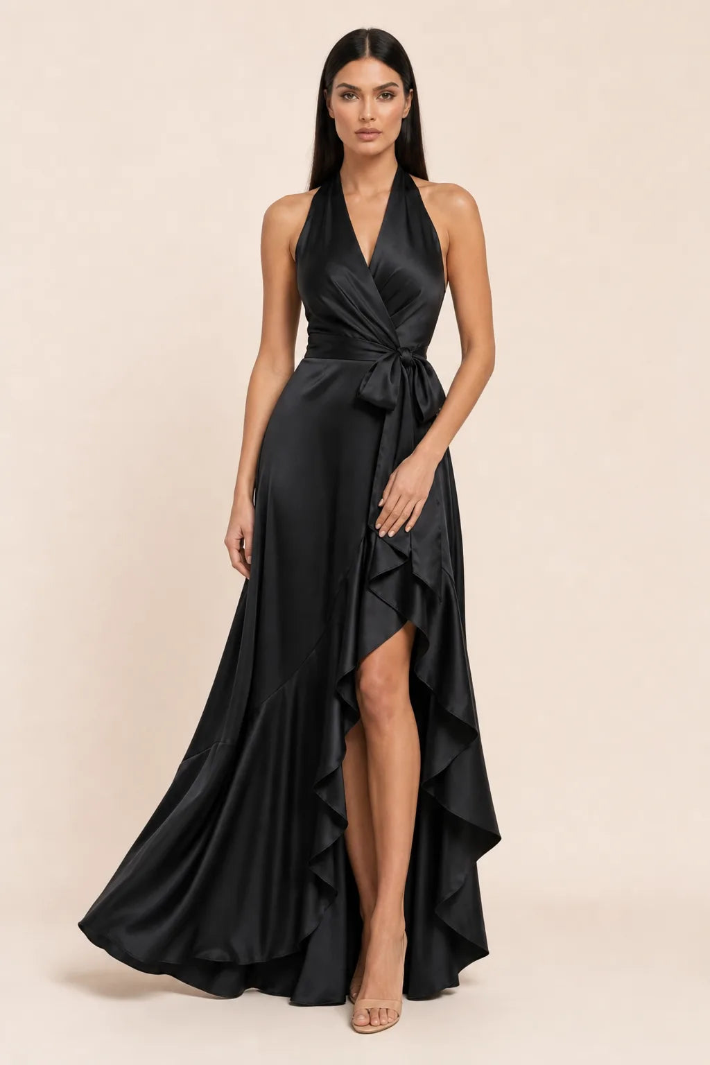 Black satin halter wrap gown on model in contrapposto stance