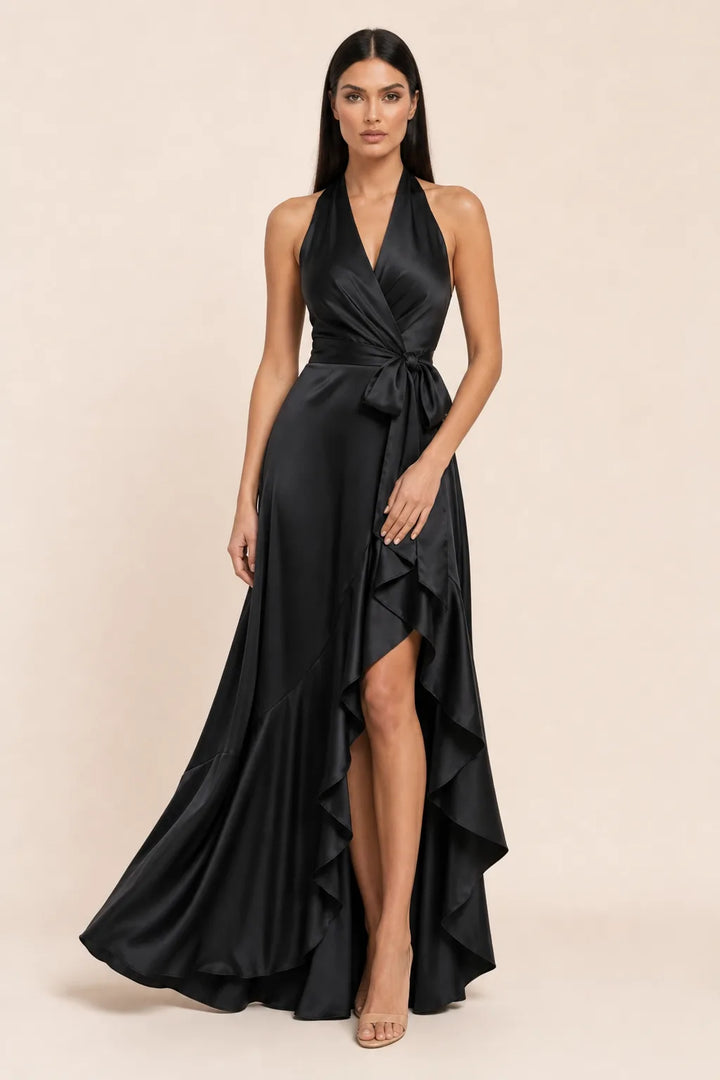 Black satin halter wrap gown on model in contrapposto stance