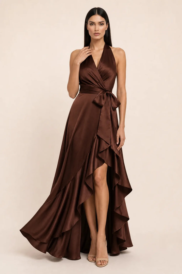Brown satin halter wrap gown on model in contrapposto stance