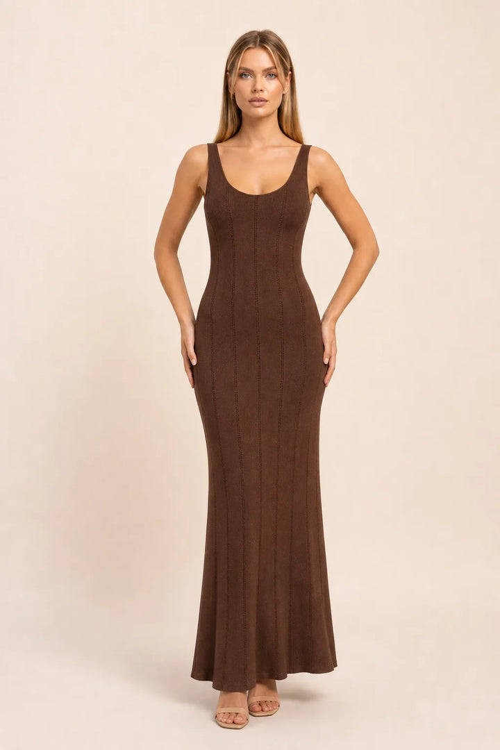 Brown panelled knit maxi dress on model in contrapposto stance, full-length view