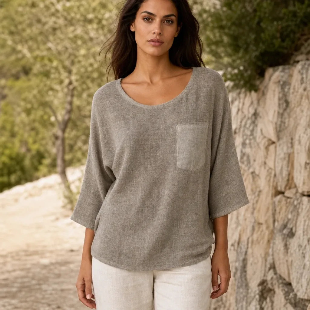 Relaxed khaki pocket top on a model in a contrapposto stance