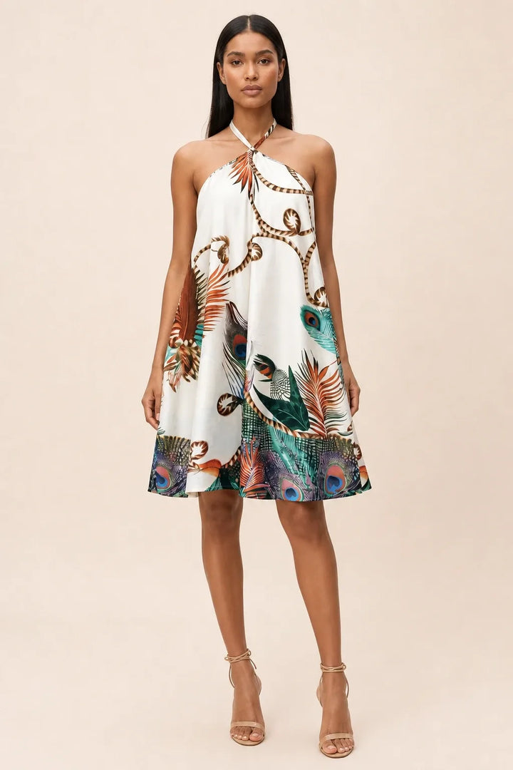 Model in khaki floral halter mini dress, standing in contrapposto pose