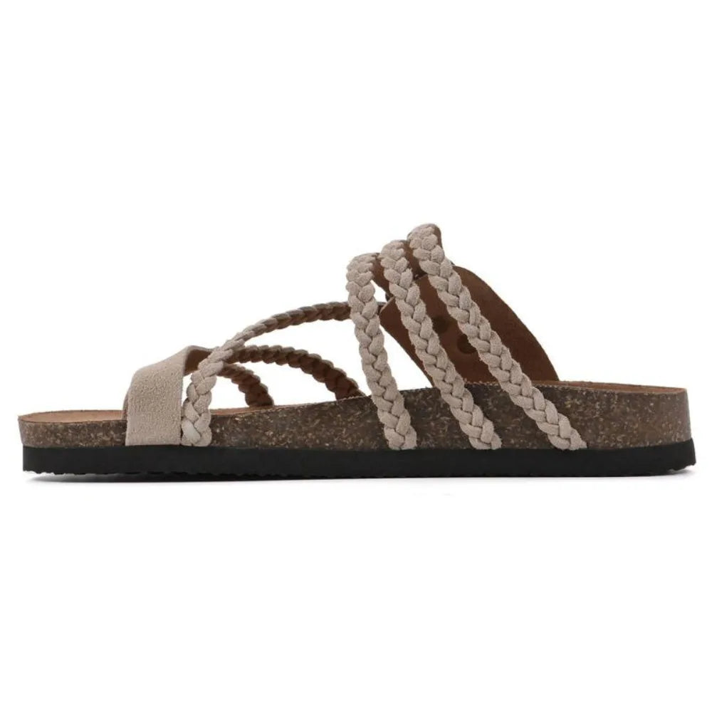 Close-up detail of green braided strap slide sandal