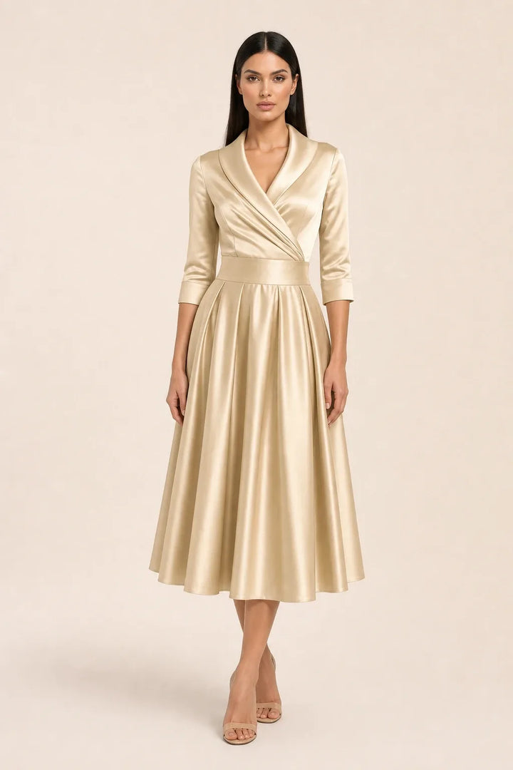 Light brown pleated satin midi skirt on a model in a contrapposto stance