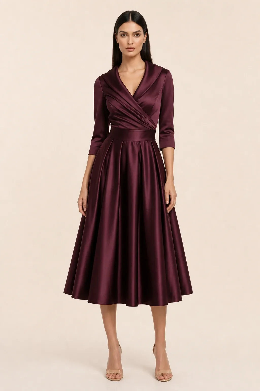 Wine red pleated satin midi skirt on a model in a contrapposto stance