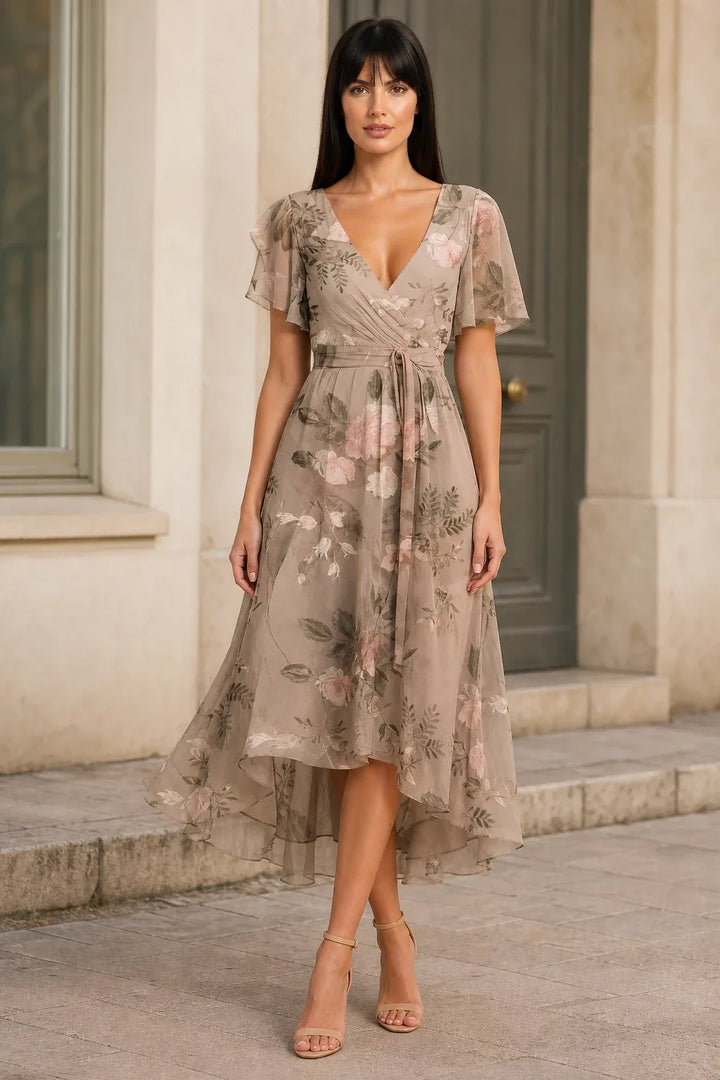 Beige floral wrap midi dress on model in contrapposto stance