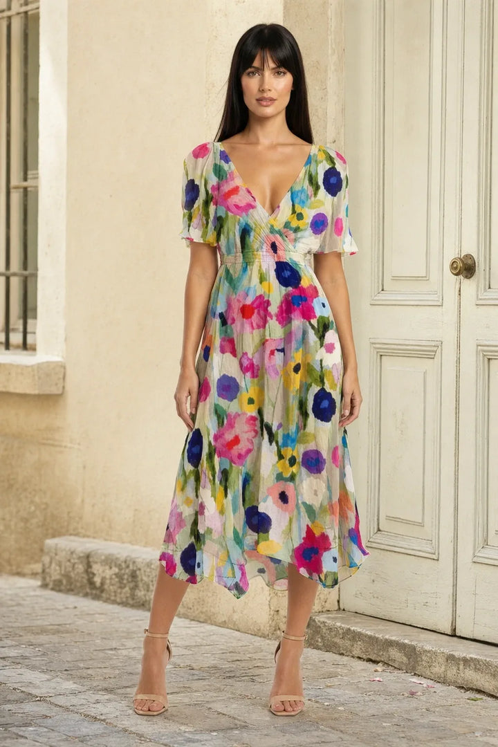 Multicolour floral wrap midi dress on model in contrapposto stance