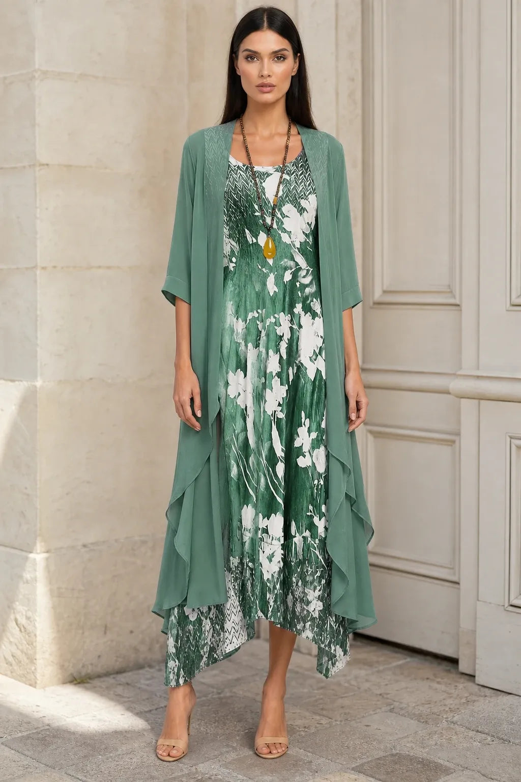 Green floral two-piece midi set on model in contrapposto stance