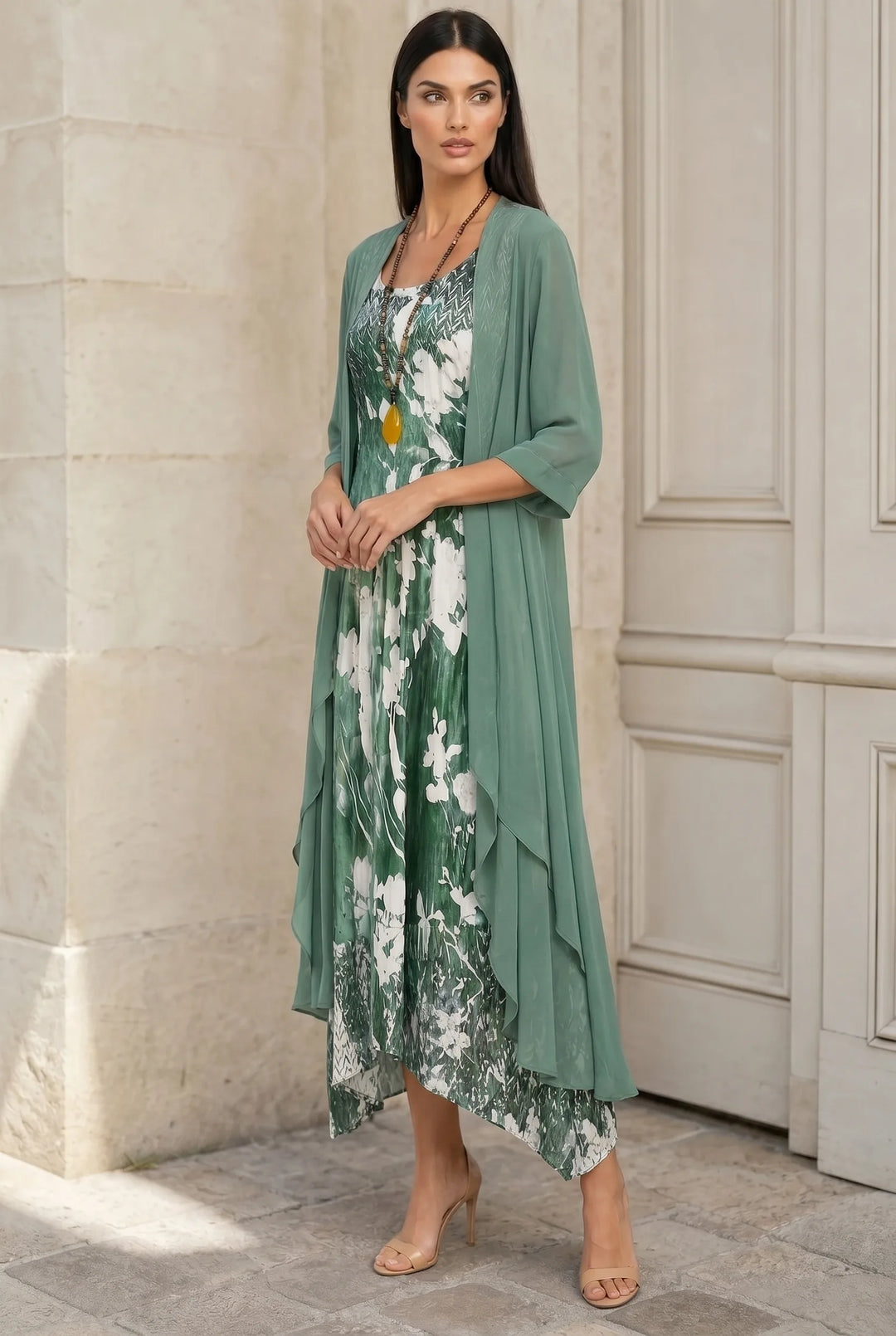 Green floral two-piece midi set on model in three-quarter turn