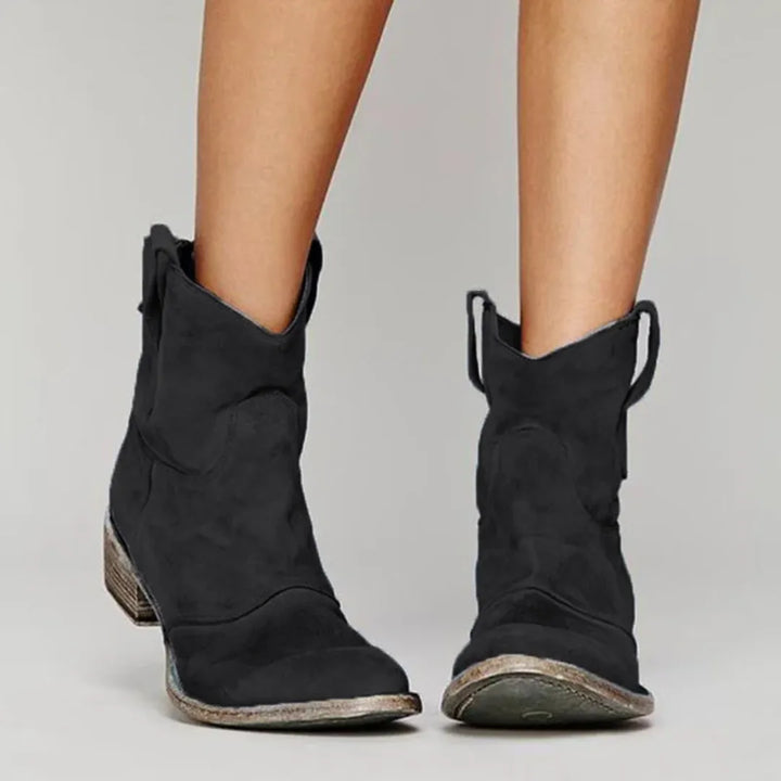 Black western ankle boot, three-quarter angle showing shaft and toe box