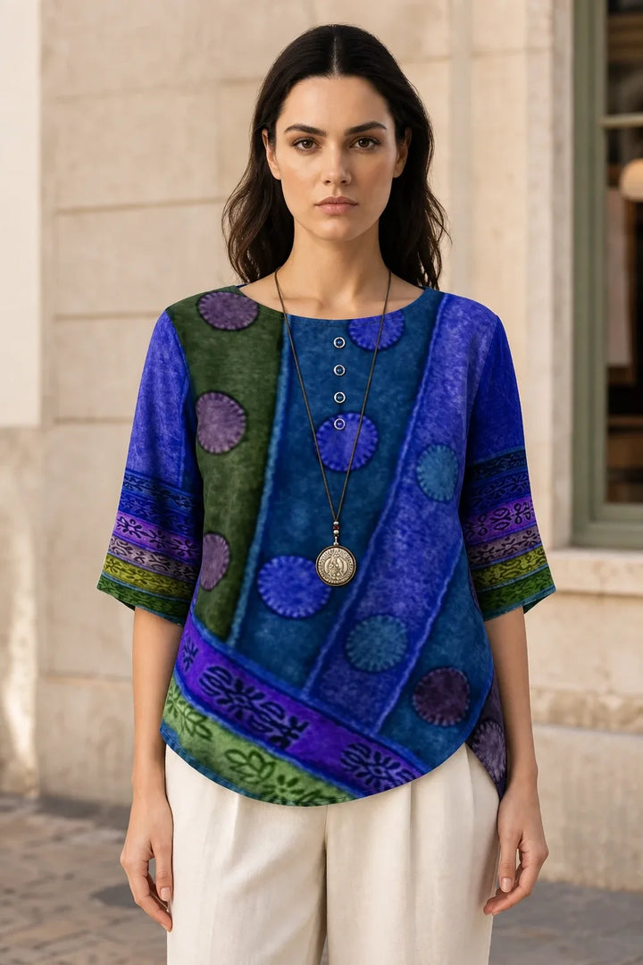 Blue violet boho print tunic blouse on model in contrapposto stance