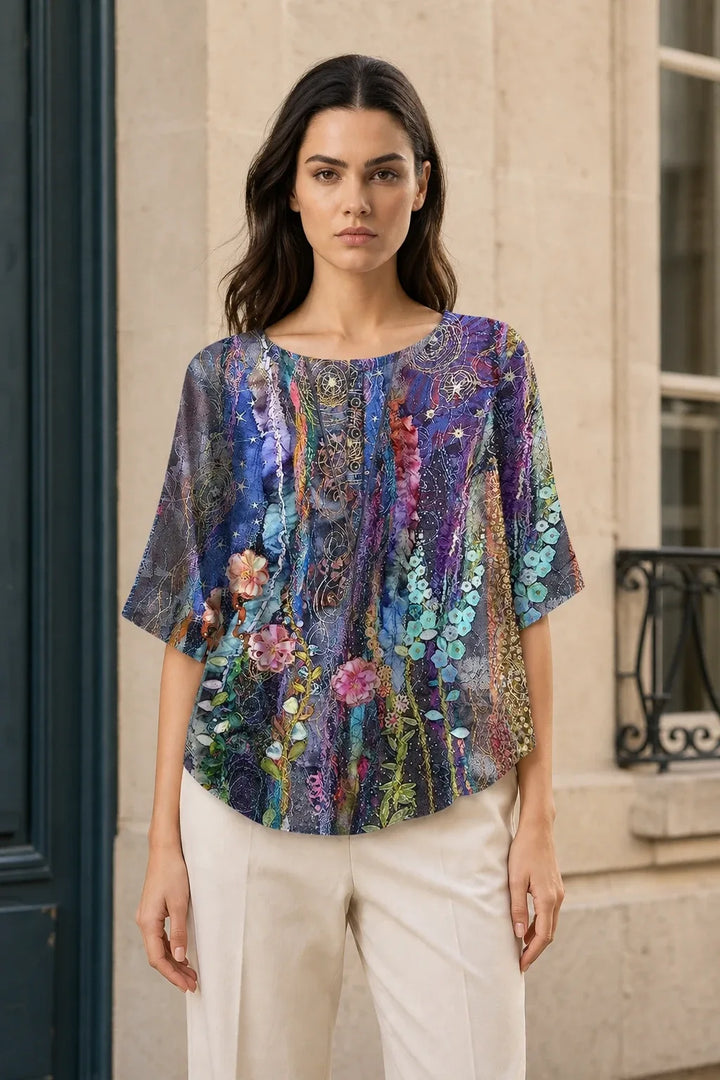 Purple boho print tunic blouse on model in contrapposto stance