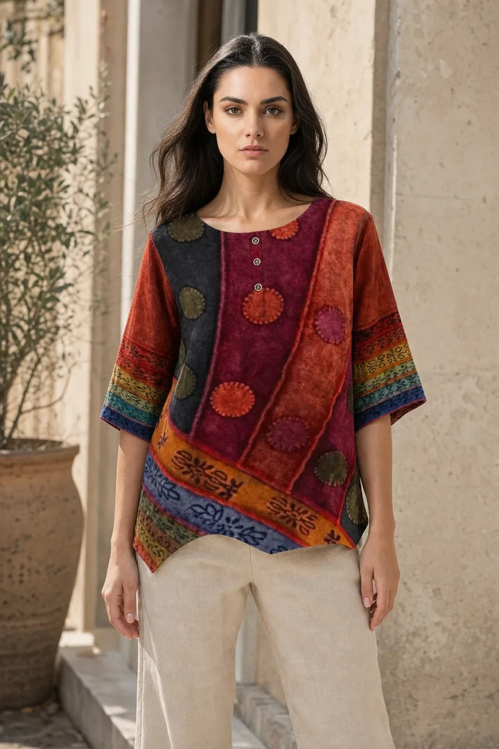 Red boho print tunic blouse on model in contrapposto stance