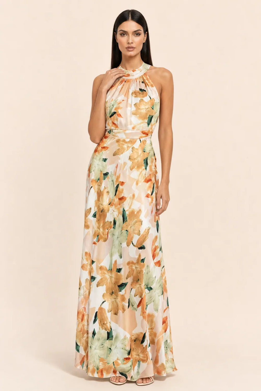 Floral halter maxi dress on model in contrapposto stance