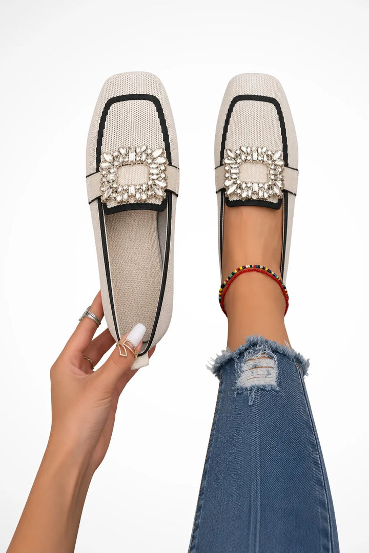 Beige loafer with jewelled buckle detail, front view