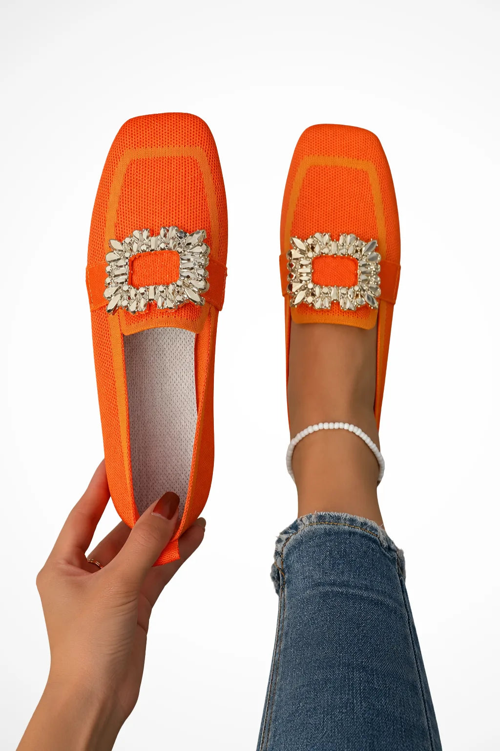 Orange loafer with jewelled buckle detail, front view