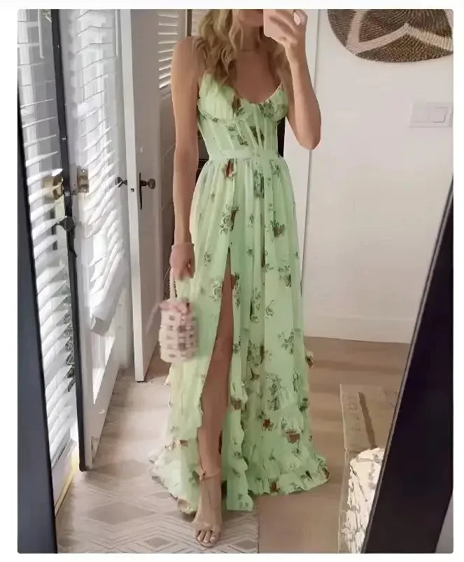 Close-up detail of green floral chiffon maxi dress fabric and print