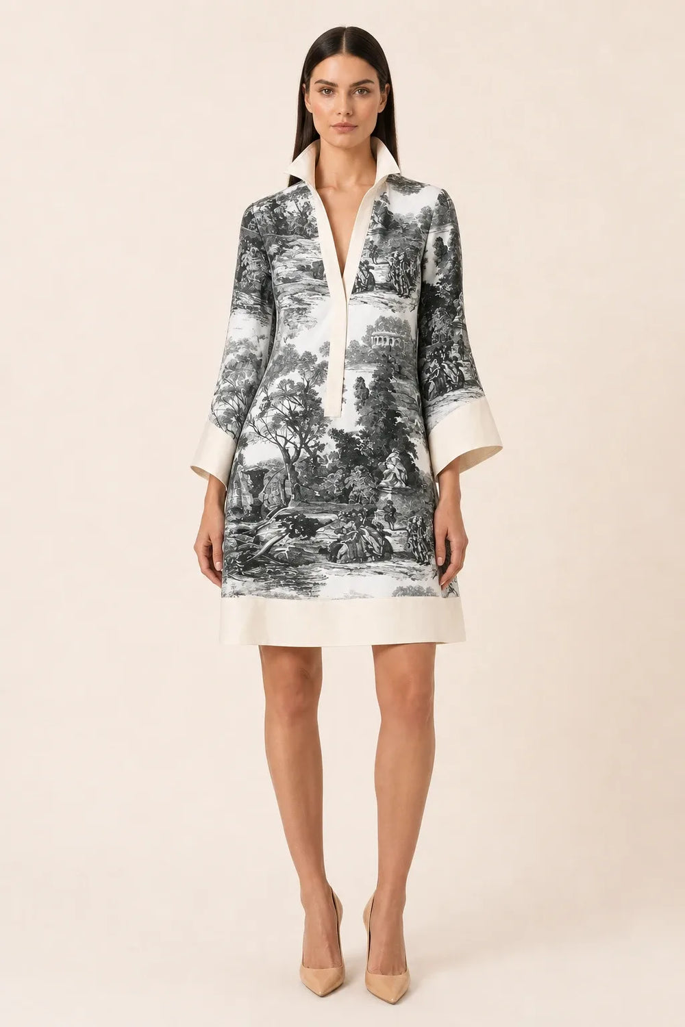 Black and white toile print shirt dress on model in contrapposto stance