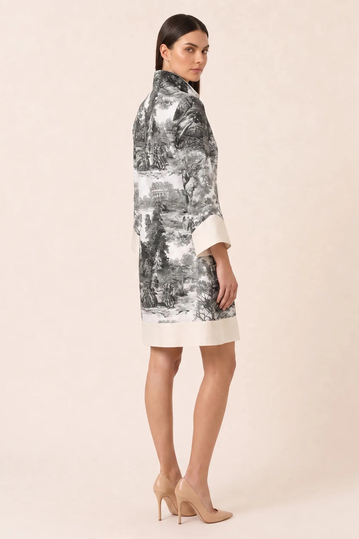Black and white toile print shirt dress on model in three-quarter turn