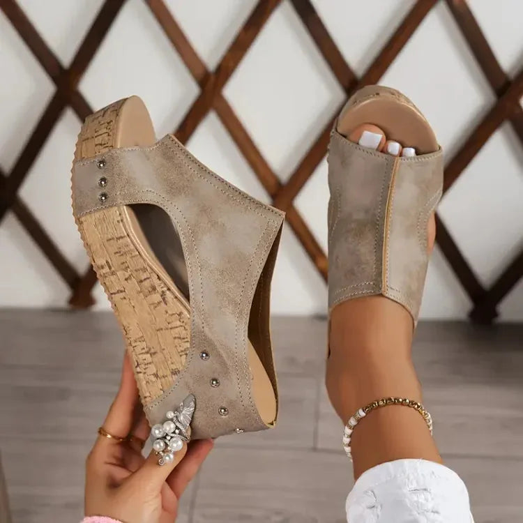 Black cork wedge platform mule in overhead or flat lay view