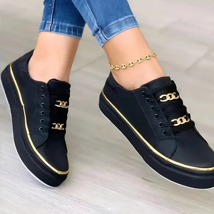 Black chain detail platform sneaker, three-quarter angle view