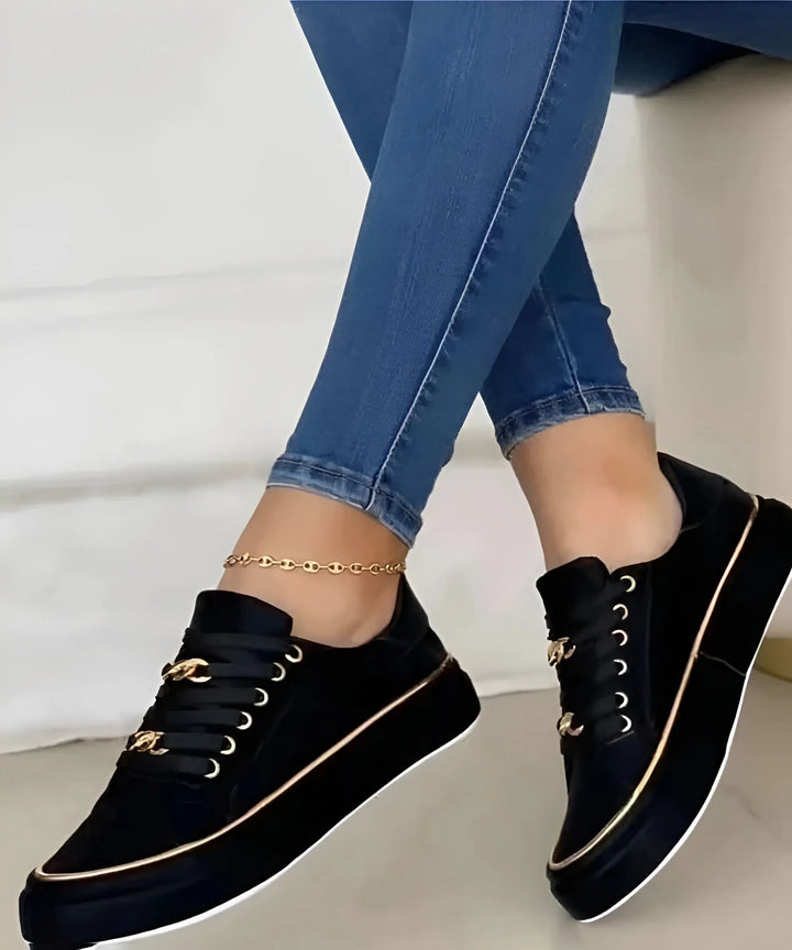 White chain detail platform sneaker, side profile view