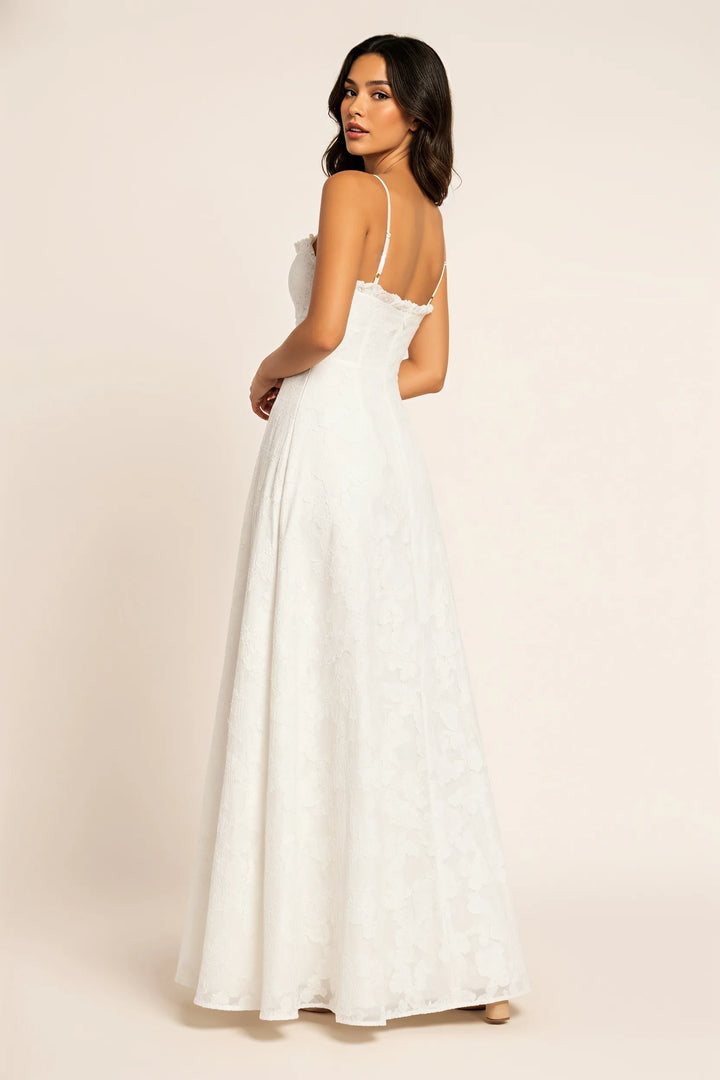 White floral appliqué maxi gown on a model in a three-quarter turn