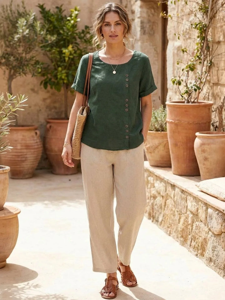 Army green button detail scoop neck top on model