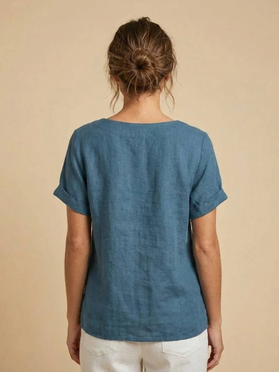 Army green button detail scoop neck top on model