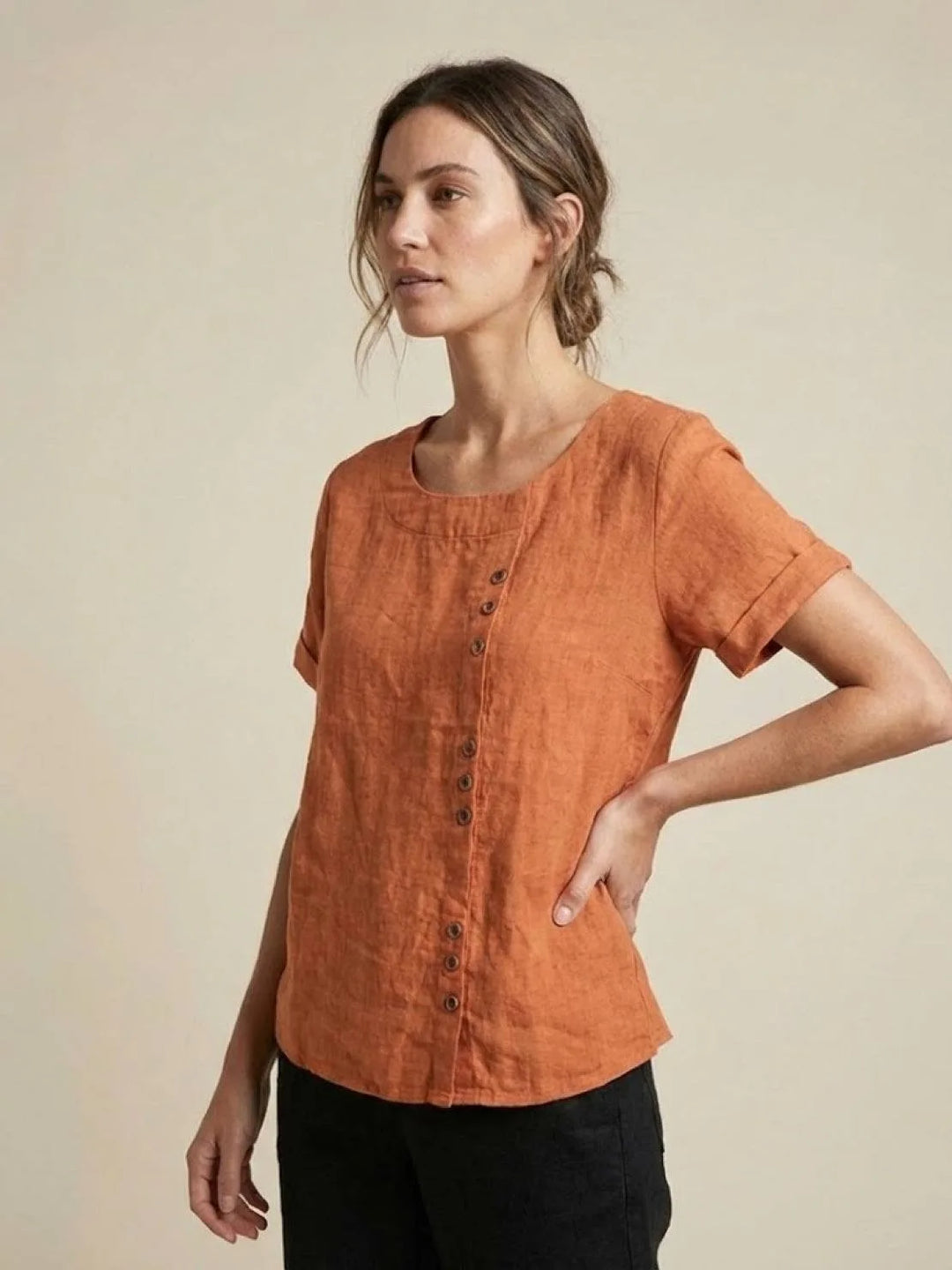 Army green button detail scoop neck top on model