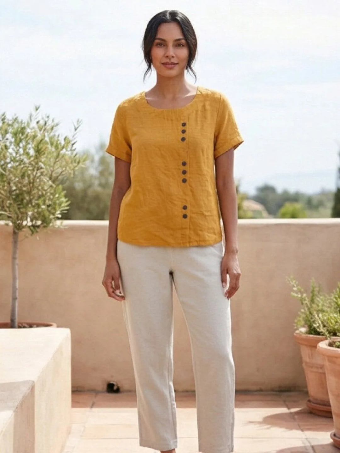 Army green button detail scoop neck top on model
