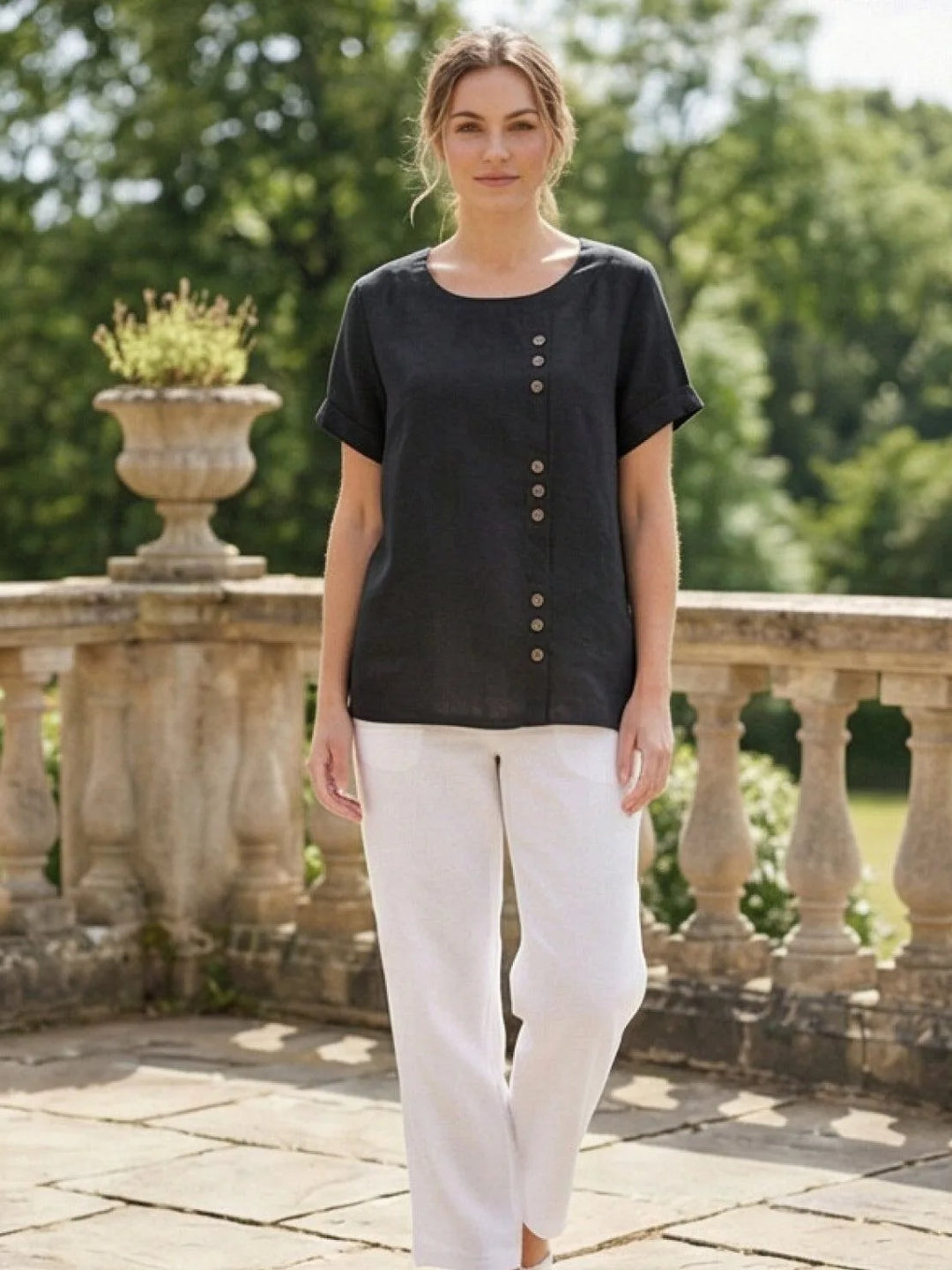 Army green button detail scoop neck top on model