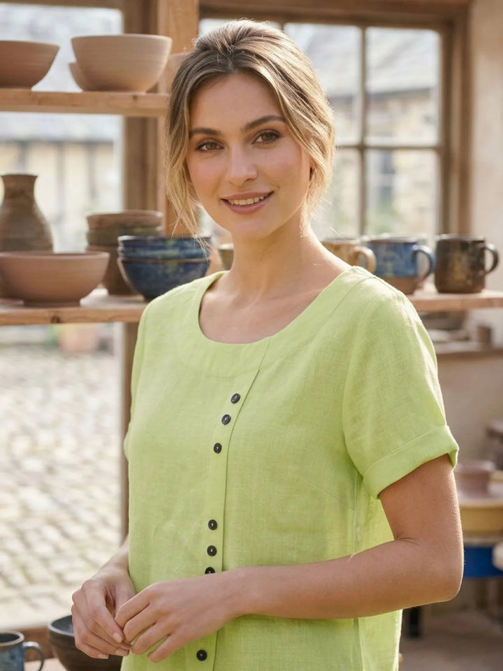 Army green button detail scoop neck top on model