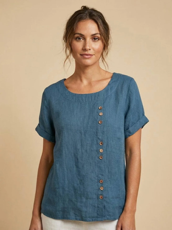 Deep teal button detail scoop neck top, model in three-quarter turn