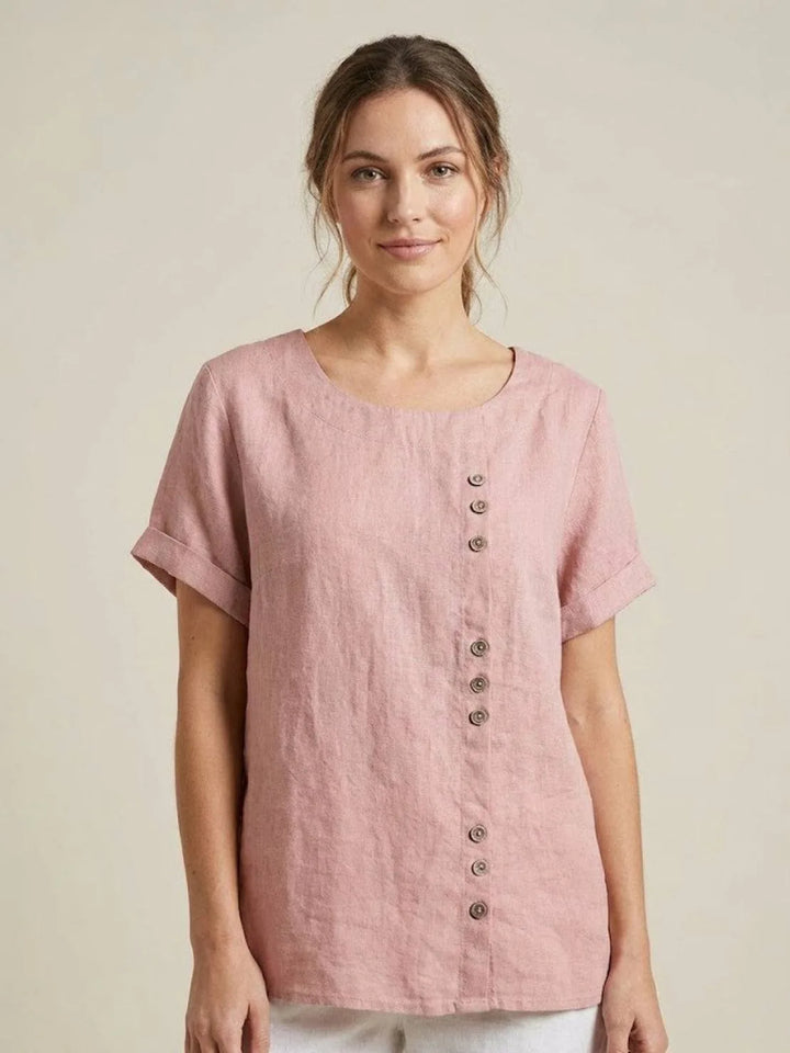 Light pink button detail scoop neck top on model