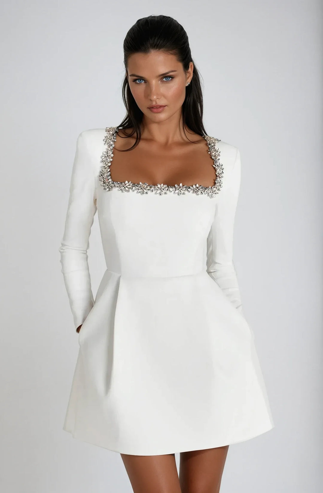 Black crystal-trim mini dress on model, back view