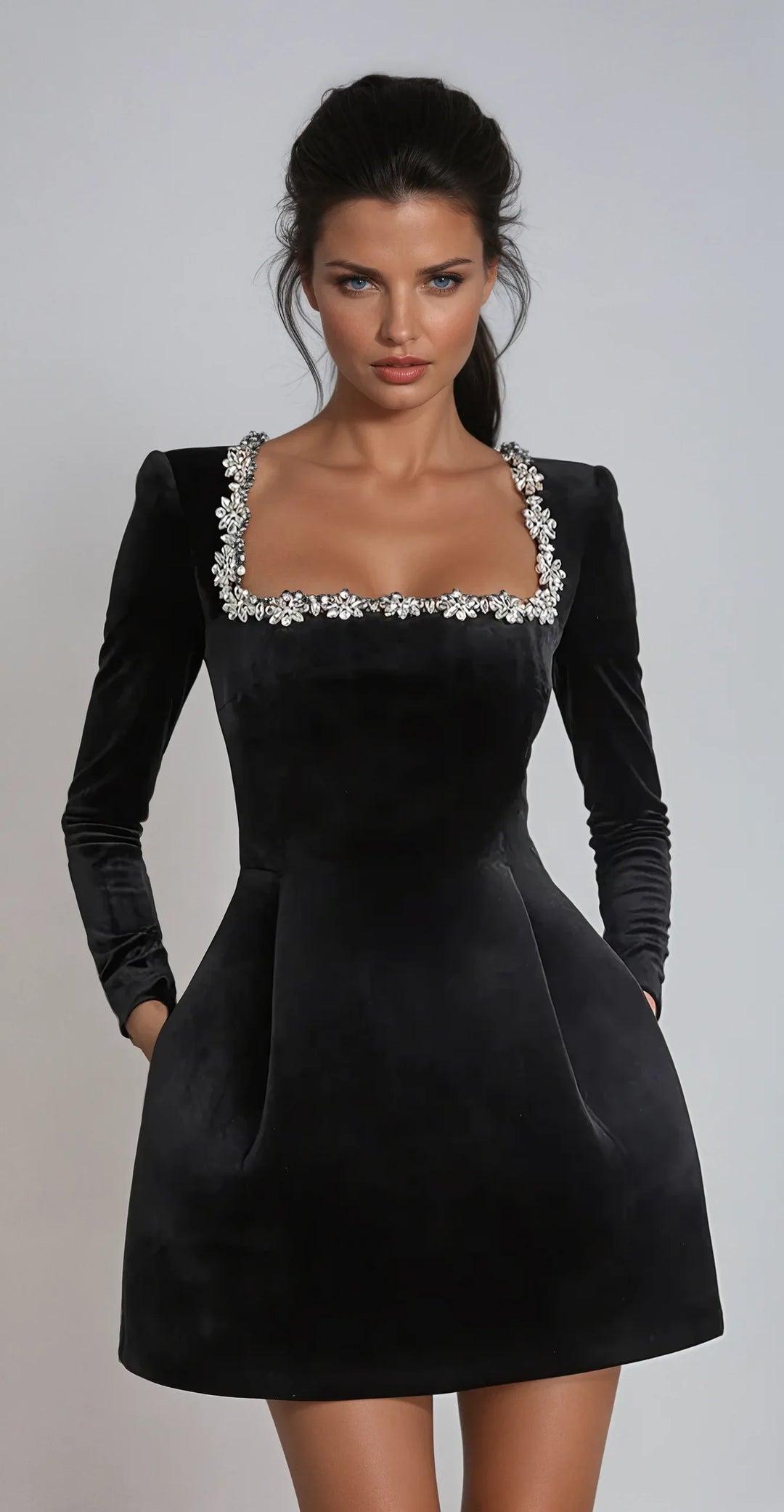 Black crystal-trim mini dress on model, full-length standing pose