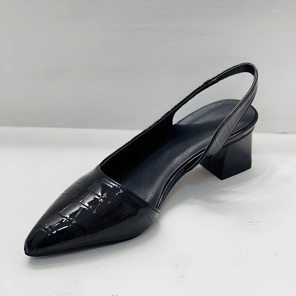 Black croc-embossed slingback pump, close-up detail view
