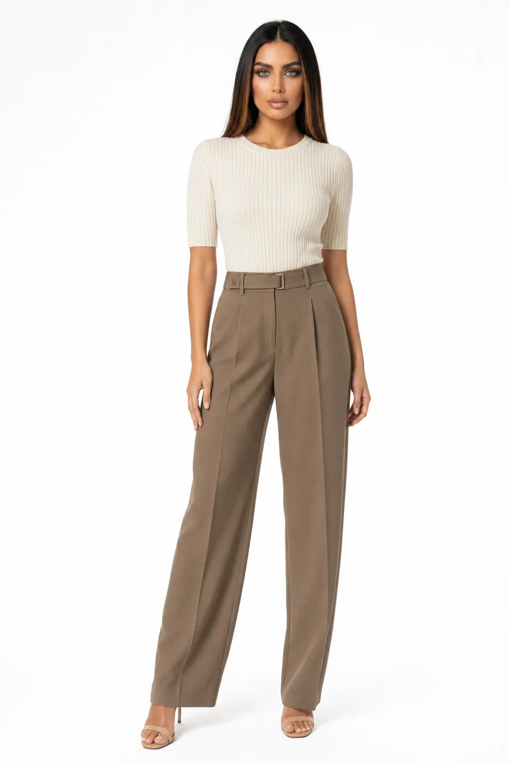 Brown pleated wide-leg trousers on a model in a contrapposto stance
