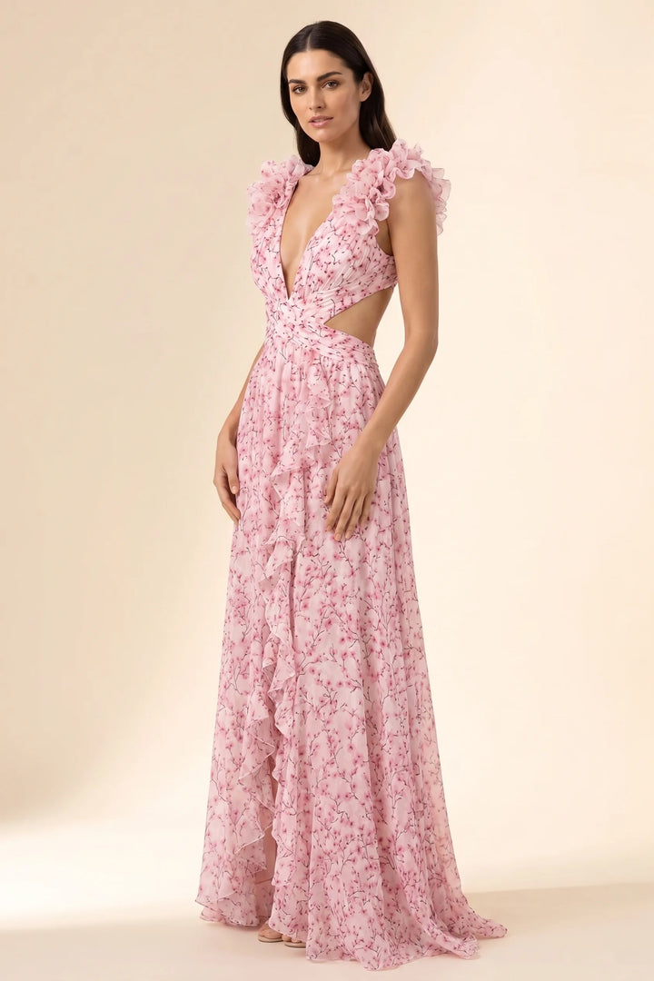 Pink ruffle-shoulder maxi dress on model in three-quarter turn